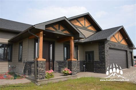 black metal house with stone|black stone exterior house.